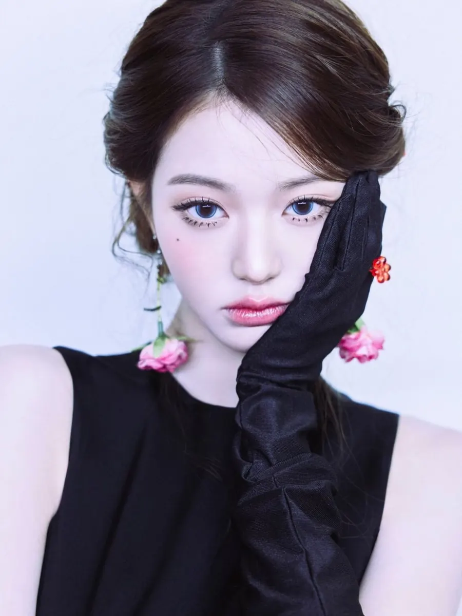 Wonyoung with winged liner and a red lip, by Kitts