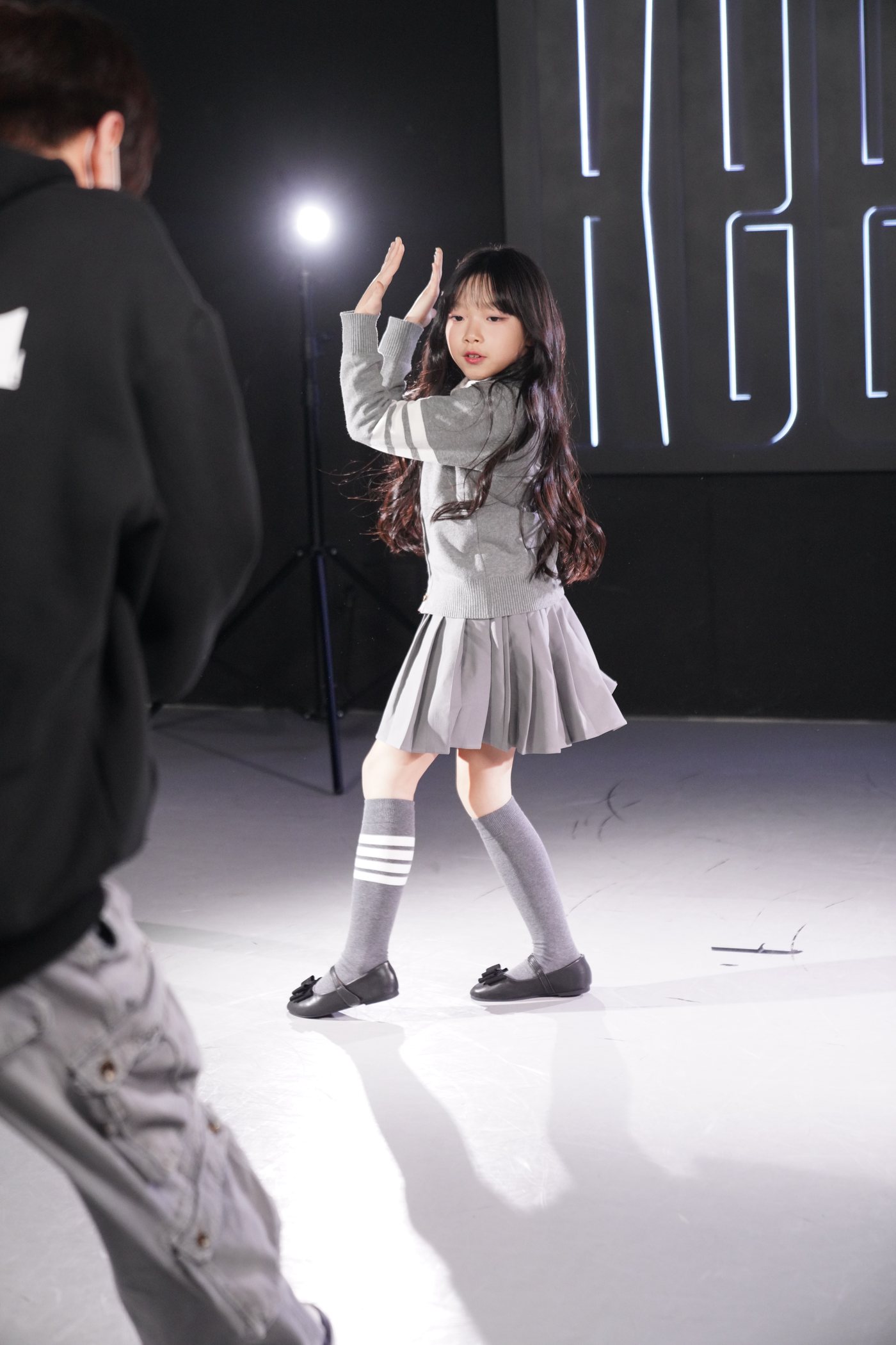 Keens Seoul studio — rehearsal pose during a filmed training session