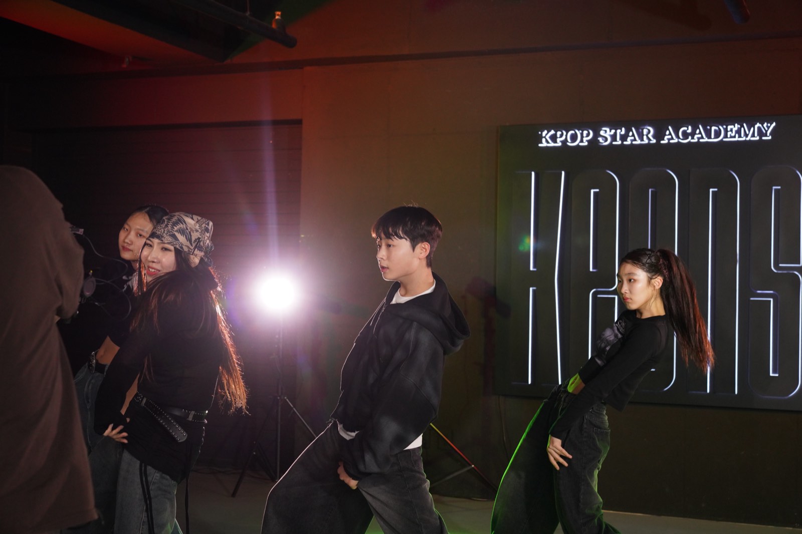 Trainees rehearsing in formation at Keens Seoul